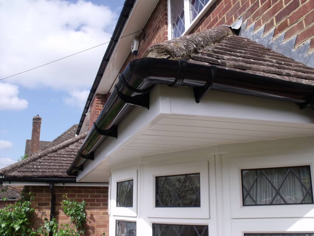 Black PVC guttering with white fascias